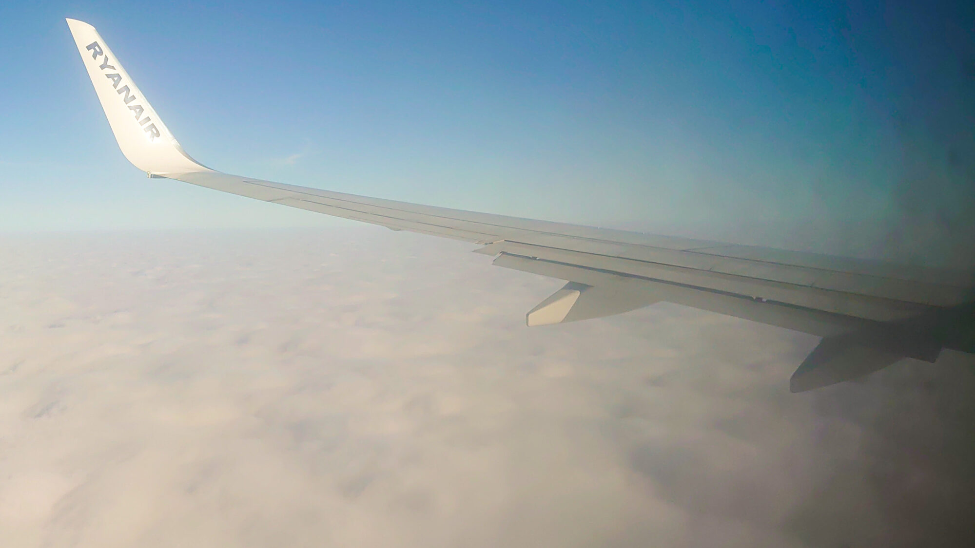 view out of the plane on traveling altitude