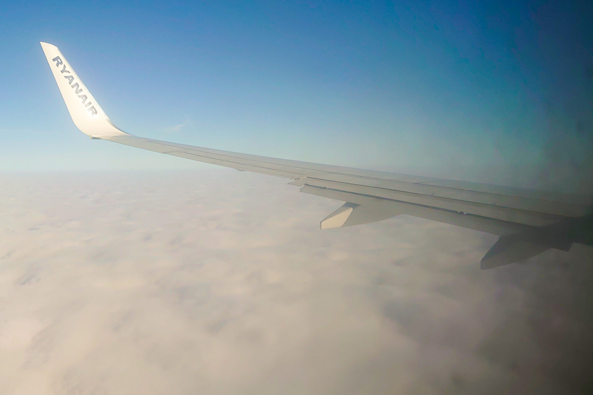 view out of the plane on traveling altitude